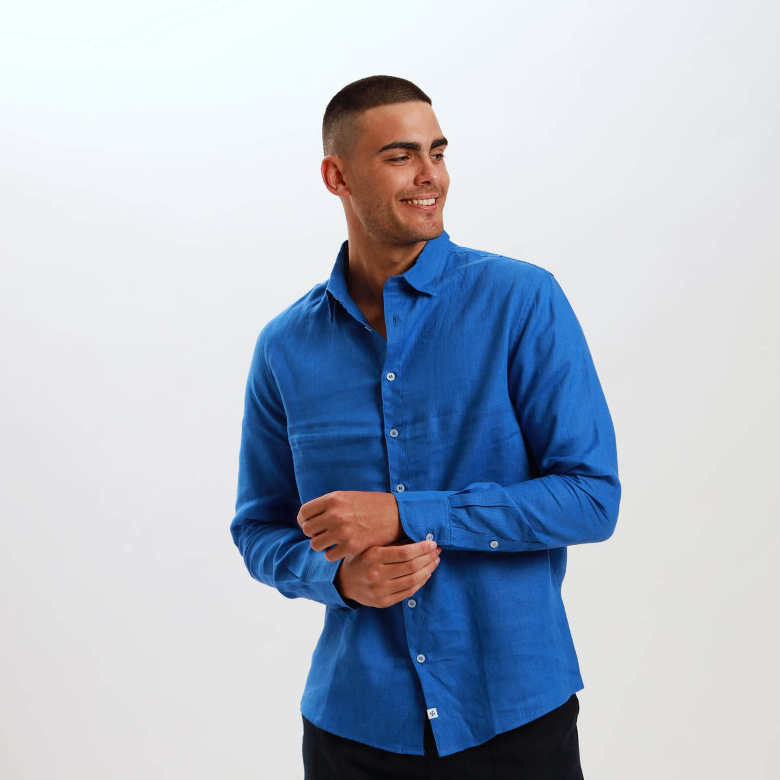 Royal Blue French linen shirt with long sleeves and collar.