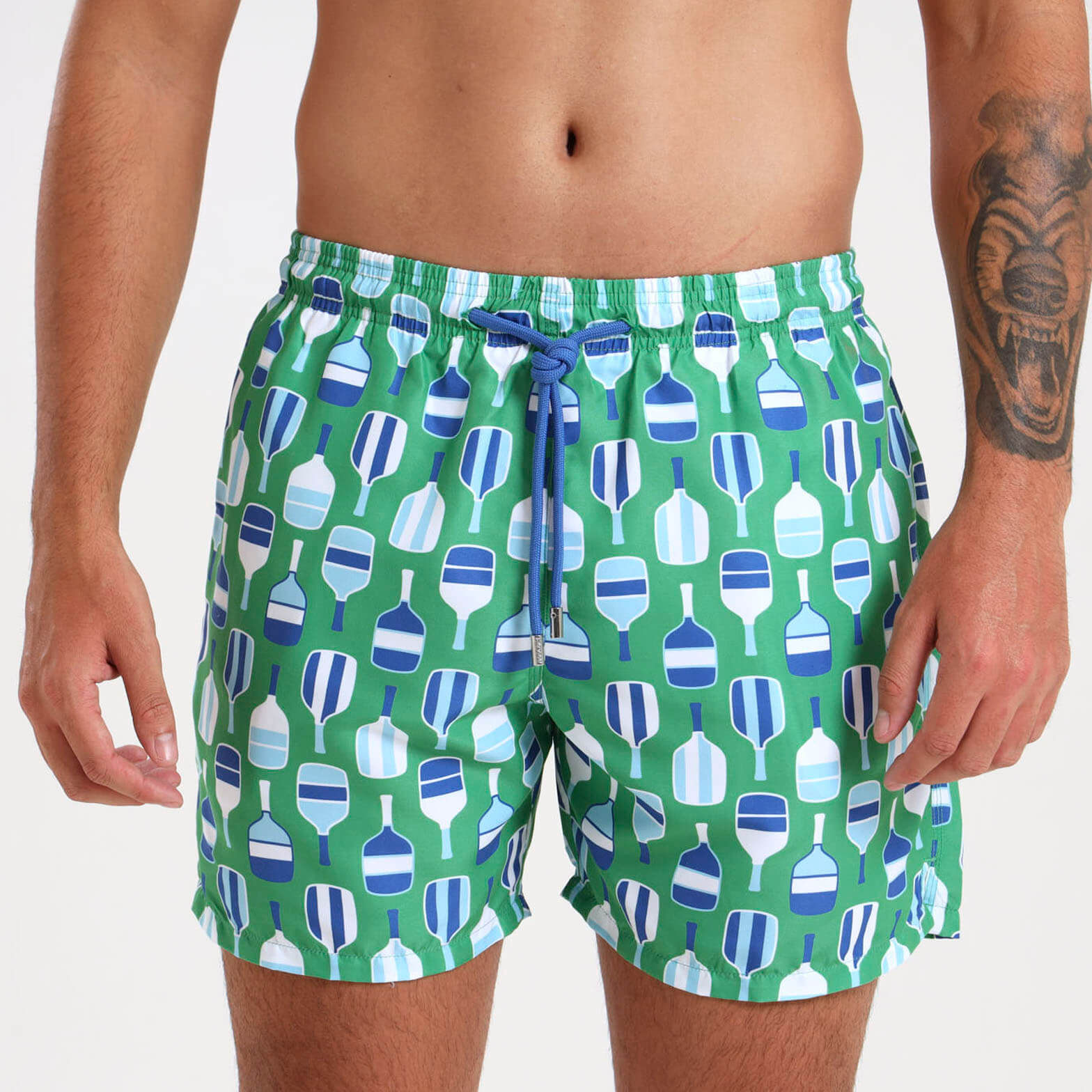 Mens swim shorts with green and blue beach bat design
