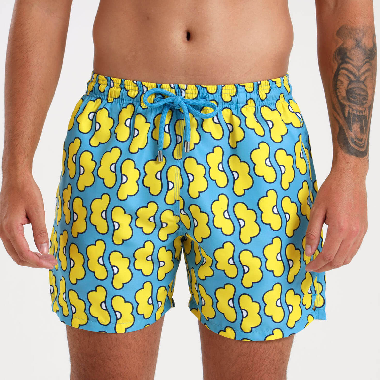 Mens premium swim trunks with a yellow and blue floral print