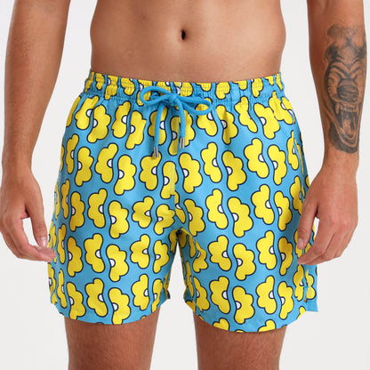 Mens premium swim trunks with a yellow and blue floral print