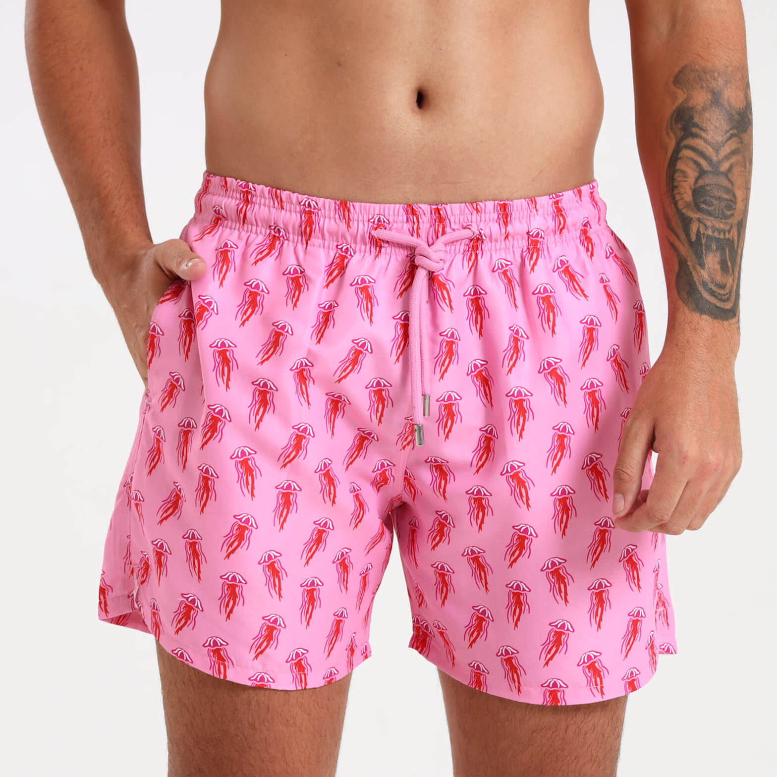 Bright and bold pink swim shorts with an all over  jellyfish pattern.
