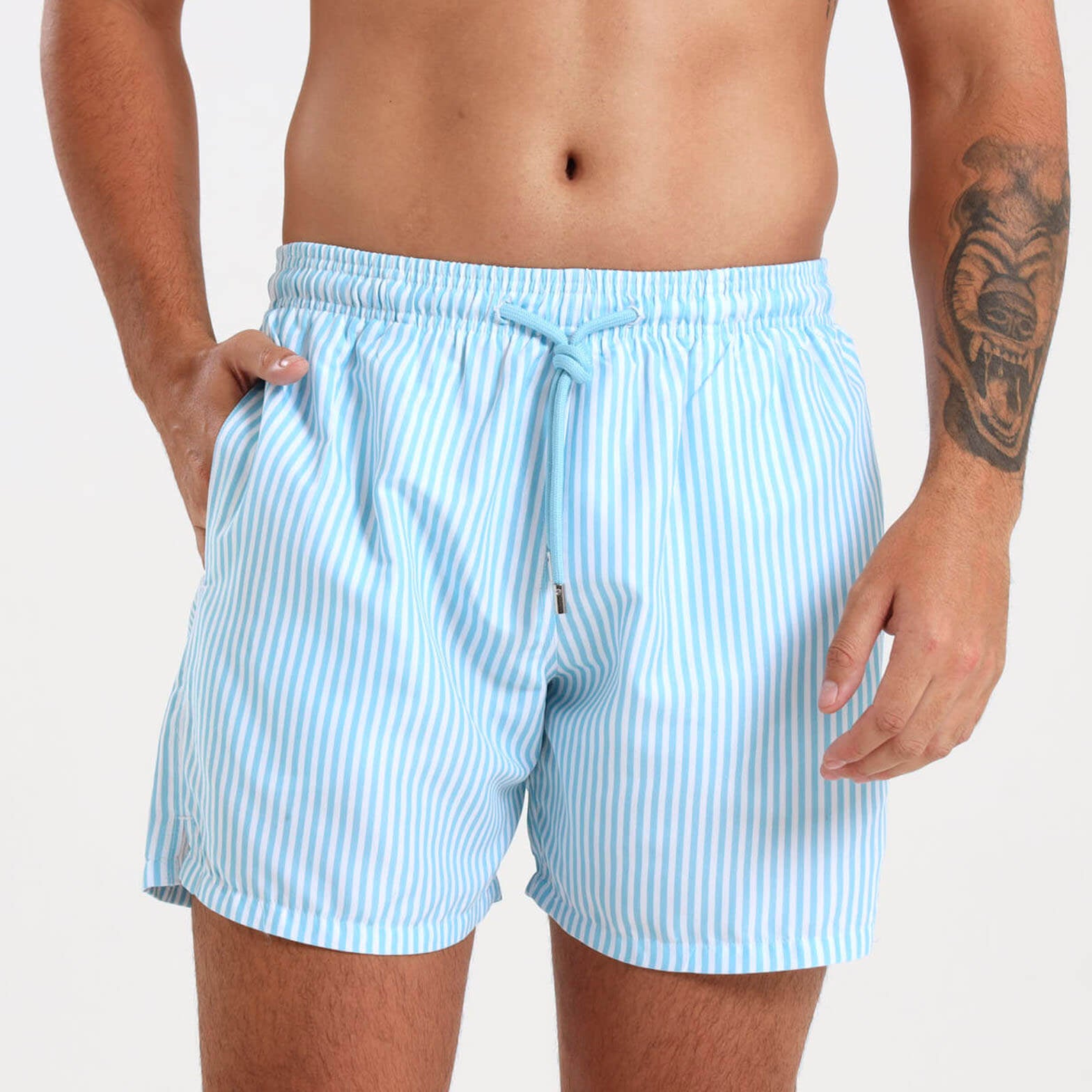 Model wearing Baby Blue Pin Stripe Breazies Mens Swim Shorts