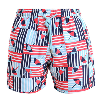 Colorful mens swim shorts with an elasticated waist band and a blue umbrella pattern 