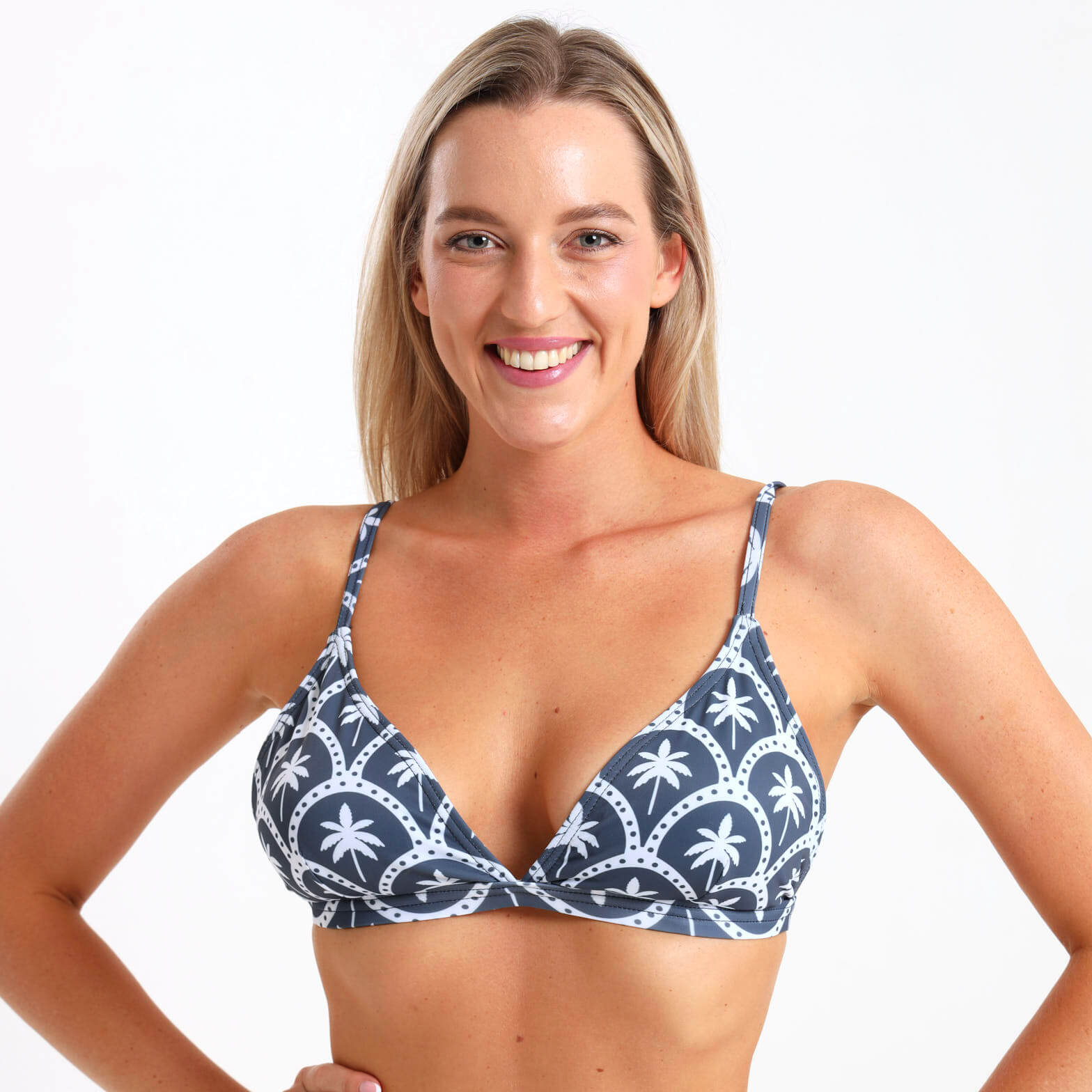 Steel blue bikini top with adjustable straps and an all over white palm design.